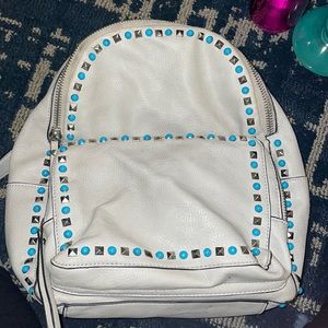 Gray studded backpack